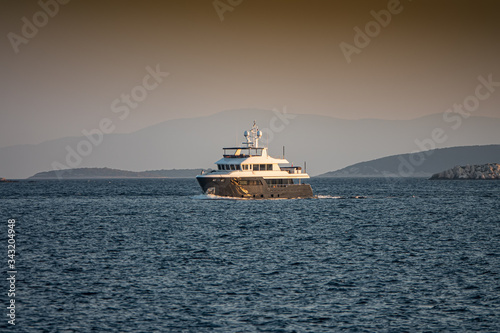 Canvas-taulu leasure boat in the Adriatic Sea on the background of the islands, Croatia