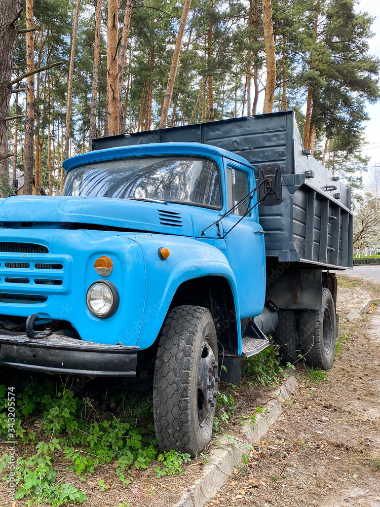  A large old blue ZIL truck.