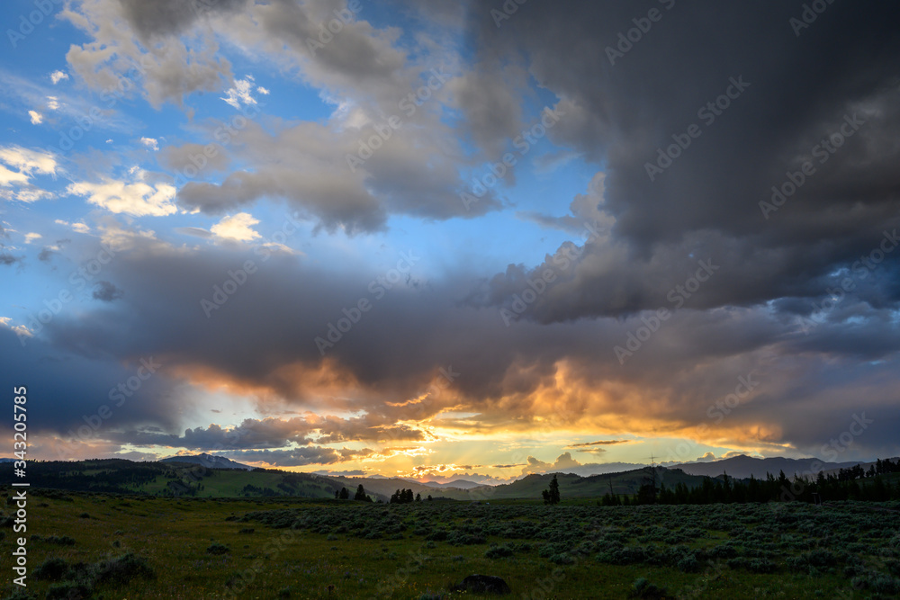 Sunset Highlights Low Clouds in Storm Over Yellowstone