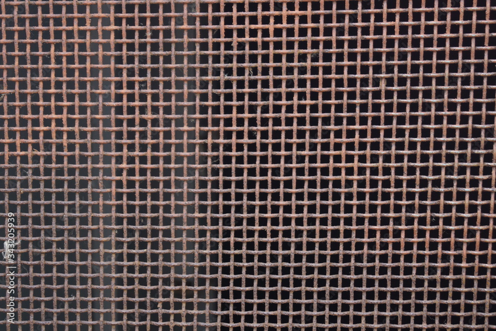 abstract grey grid background Metal mesh on a black background abstract grey grid background Metal mesh on a black background