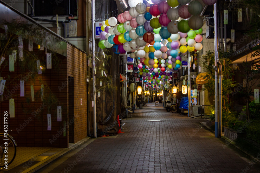 colorful lanterns in a dark street
