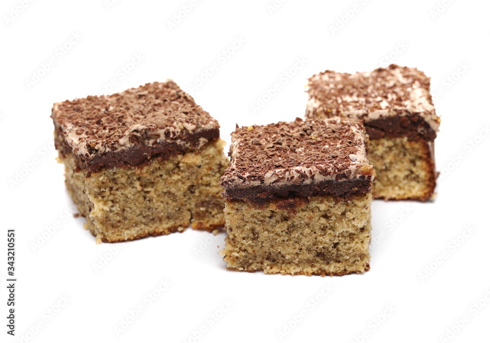 Chocolate cake, pastry slices with walnuts isolated on white background