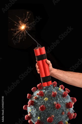 Plakat Hand placing explossive dynamite on Coronavirus molecule structure to destroy it.