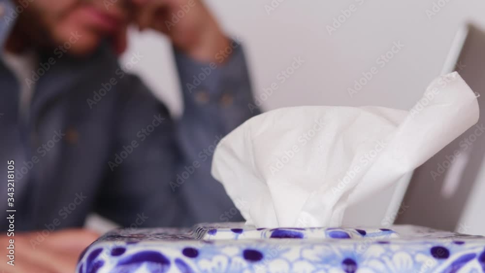 Responsable Business man coughing and takin paper tissue Responsable Business man coughing and takin paper tissue