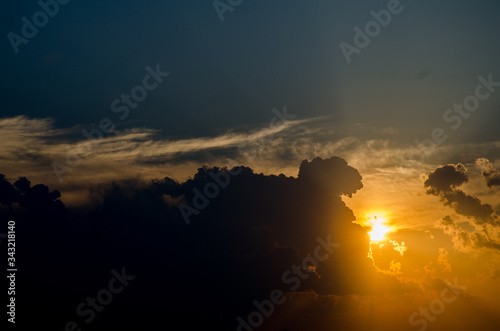 Sunset   sunrise with clouds  light rays and other atmospheric effect