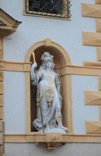 Beautiful marble statue of Bellona in the wall niche on the street, Graz, Austria