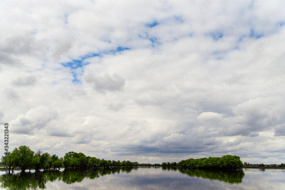 A river that overflowed its banks.Spring flood