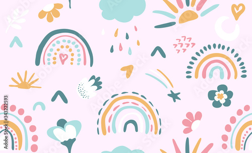 Seamless vector pattern with hand drawn rainbows and sun. Trendy baby texture
