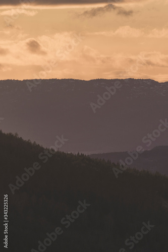 Evening landscape with Layers of mountain. © oleksandr