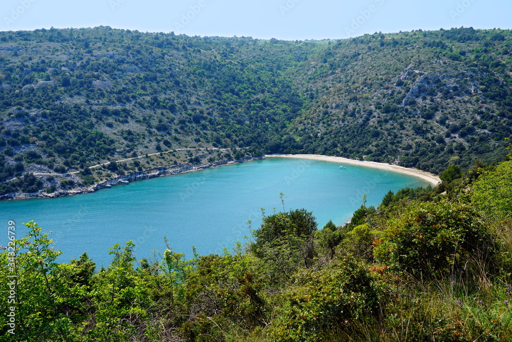 Turquoise lagoon and sea beach in the unpolluted environment on Istria peninsula