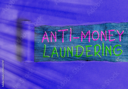 Conceptual hand writing showing Anti Money Laundering. Concept meaning stop generating income through illegal actions photo