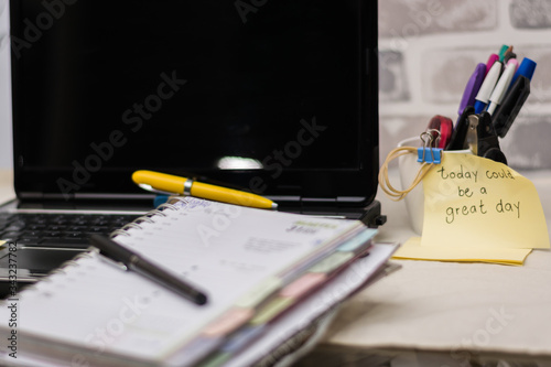 home office work with laptop planner and desk pens
