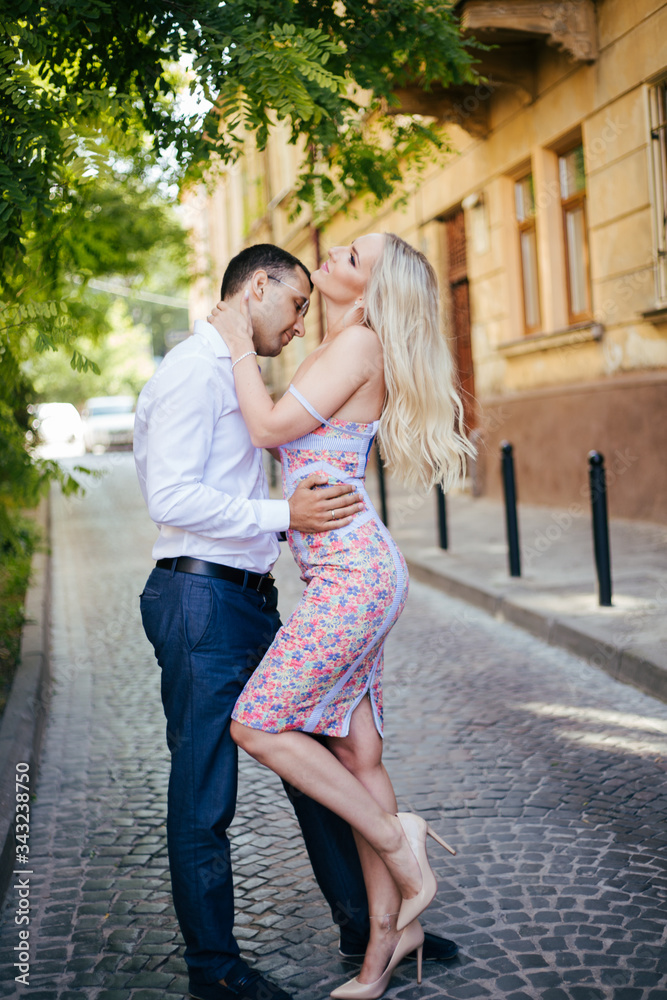 Fototapeta premium Smiling couple in love outdoors, lviv. summer