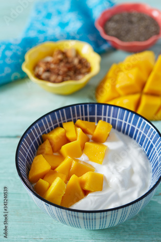 mango and greek yogurt bowl © Diana Taliun