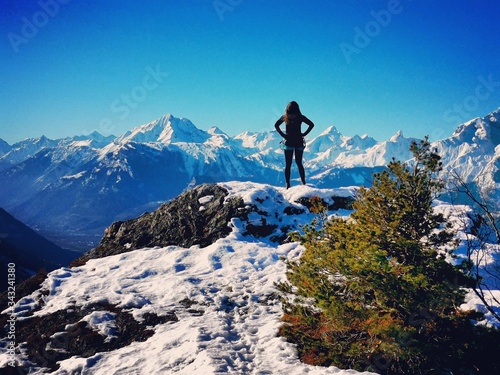 girl on the top of mountain