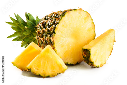pineapple juicy yellow fruit with slices and leaf isolated on white background