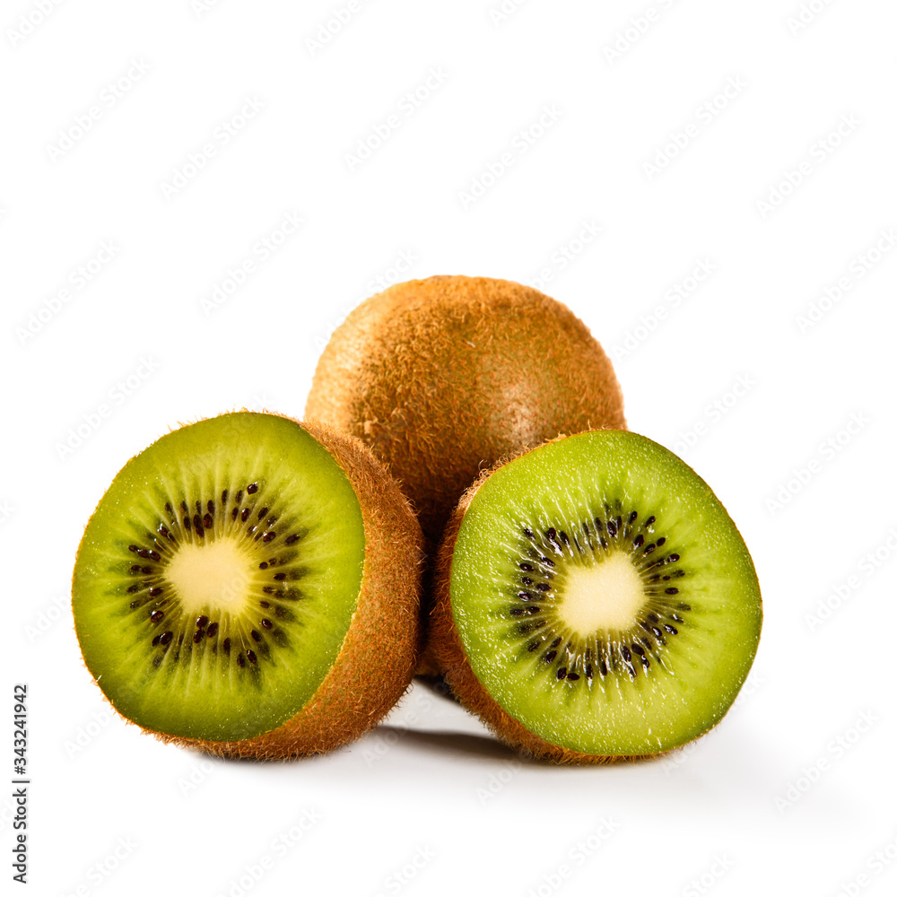 Ripe whole and sliced kiwi fruit isolated on white background macro Close-up Ripe whole and sliced kiwi fruit isolated on white background macro Close-up
