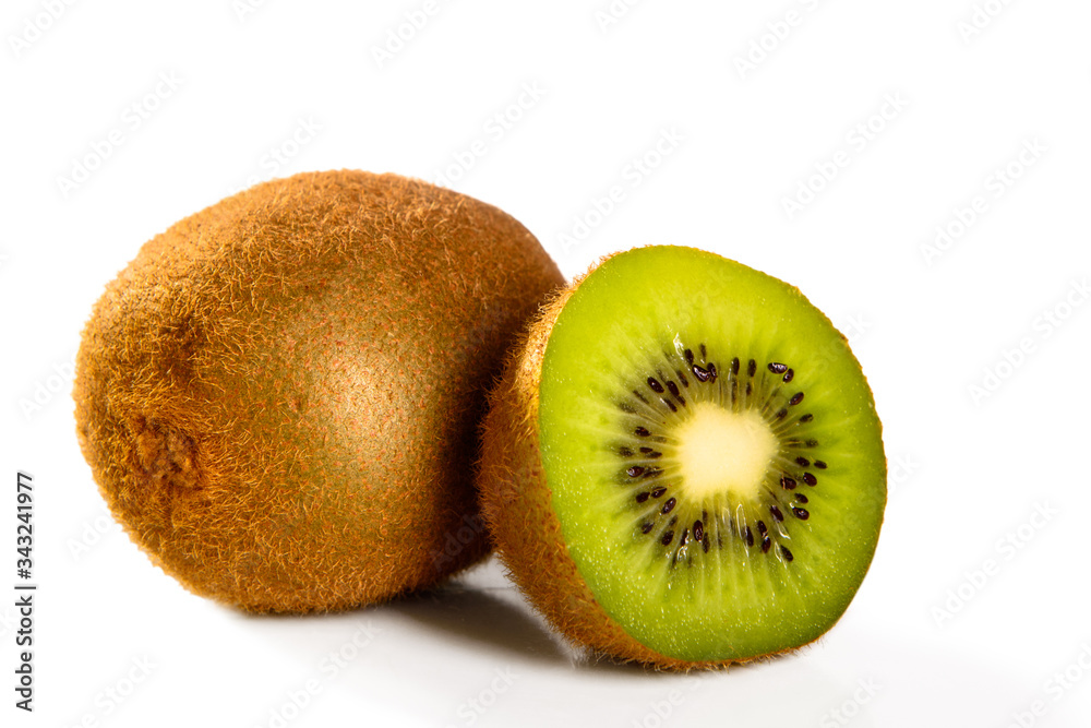 Obraz premium Ripe whole and sliced kiwi fruit isolated on white background macro Close-up