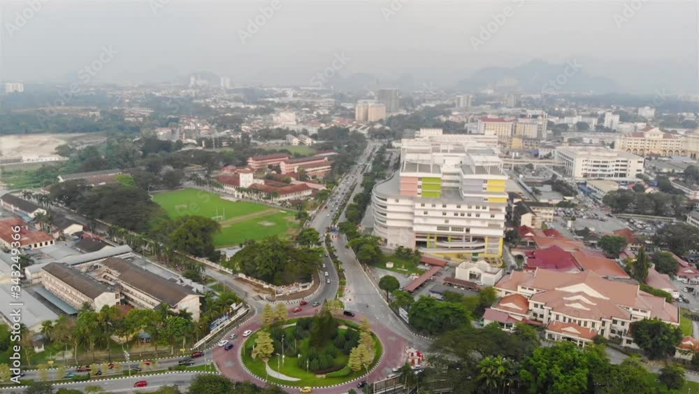 Combination of city view and busy traffic with mountain in the distance - Dolly Backwards Combination of city view and busy traffic with mountain in the distance - Dolly Backwards