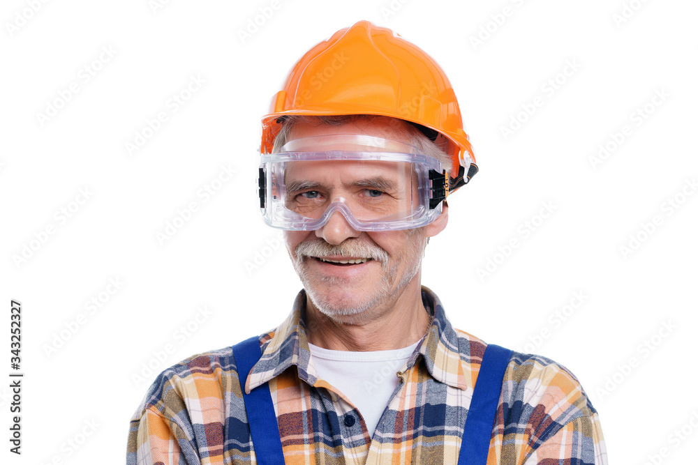 Portrait of old foreman smiling in his yellow hardhat smile on white background Portrait of old foreman smiling in his yellow hardhat smile on white background
