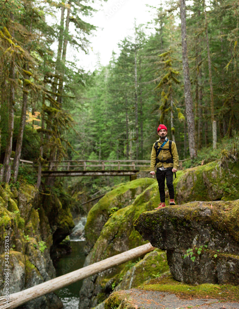 man posing in lush green landscape, Washington man posing in lush green landscape, Washington