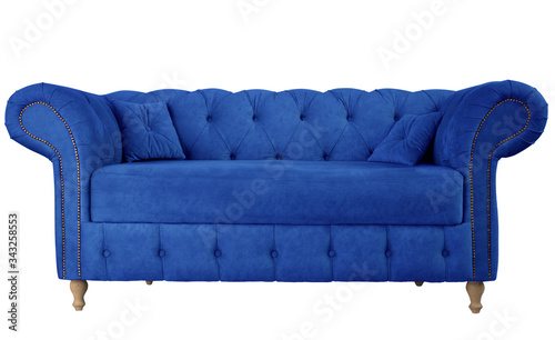 Navy blue sofa with pillows on wooden legs isolated on white. Darck blue suede couch isolated