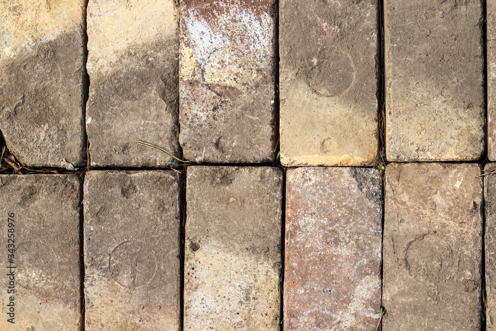 Obraz premium Old paved bricks texture pattern