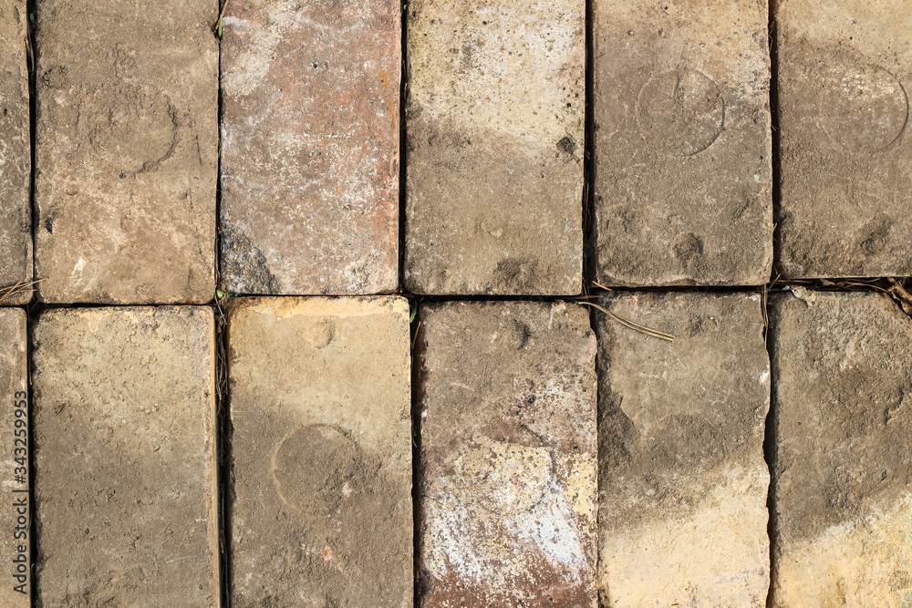 Obraz premium Old paved bricks texture pattern