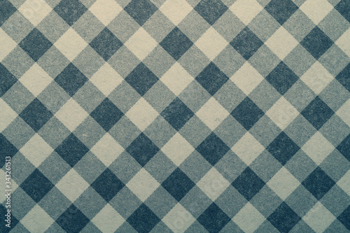 Fabric texture close up. checkered tablecloth. textile background