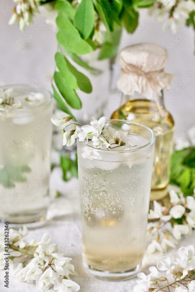 lemonade with a syrup of white acacia flowers. organic food from nature. natural habitat. Edible flowers. lemonade with a syrup of white acacia flowers. organic food from nature. natural habitat. Edible flowers.