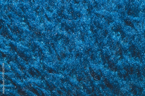 Soft fabric texture. blue textile with curly fibers. wool background