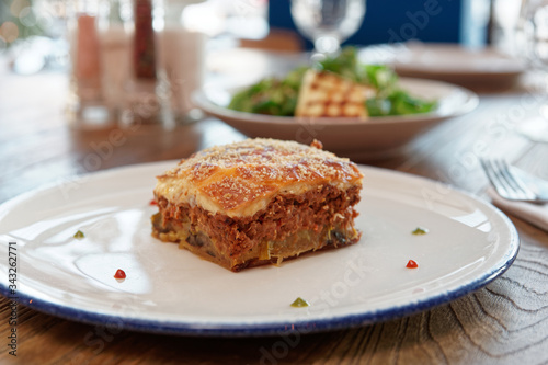 Moussaka and fried feta cheese