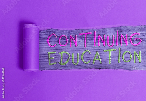 Conceptual hand writing showing Continuing Education. Concept meaning Continued Learning Activity professionals engage in photo