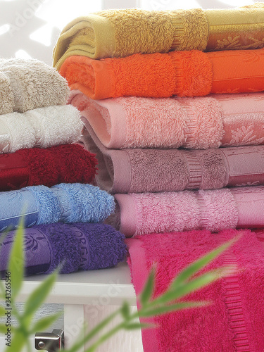 Stack of clean soft colorful towels. 