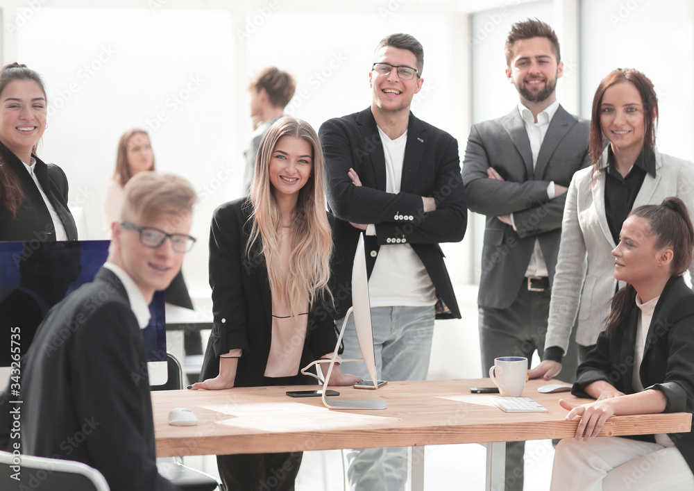 portrait of a group of young employees in the workplace portrait of a group of young employees in the workplace