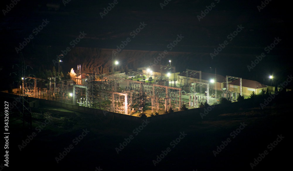 Night scene of power station. Zoom shot. Long exposure. Selective focus