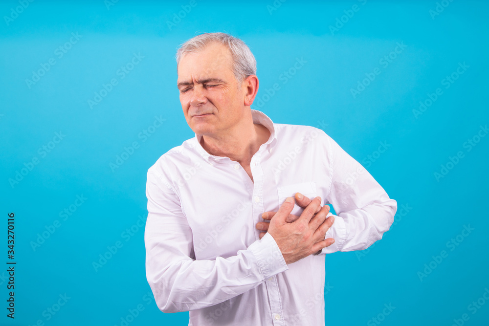 isolated adult man with expression of pain