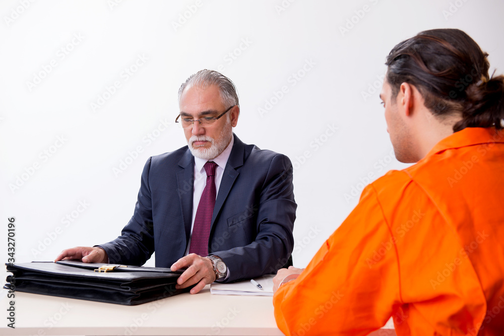 Young captive meeting with advocate in pre-trial detention Young captive meeting with advocate in pre-trial detention