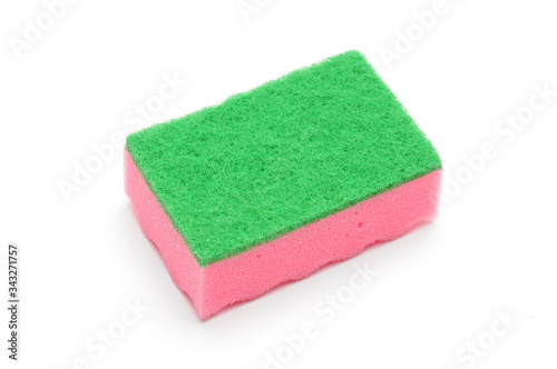 Sponge for washing dishes and plumbing on a white background