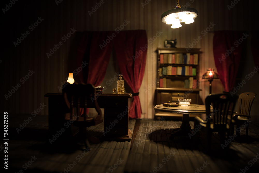 A realistic dollhouse living room with furniture and window at night. Artwork table decoration with handmade realistic dollhouse. A realistic dollhouse living room with furniture and window at night. Artwork table decoration with handmade realistic dollhouse.