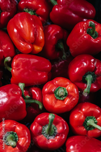 Mock up of red bell pepper for sale in a greengrocery. Background can be used for greengrocer.