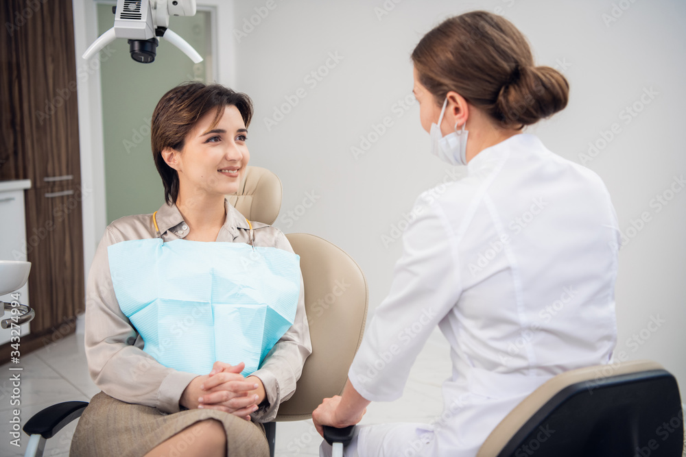 Dentistry visit, preventive medical annual check up. Positive facial expression