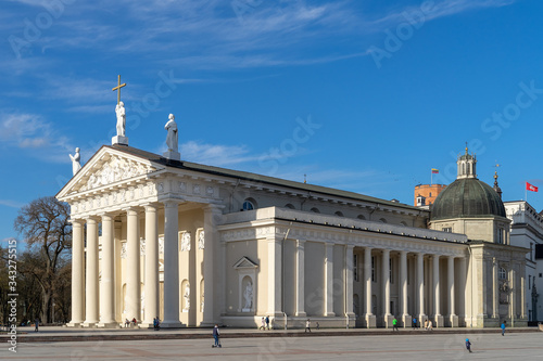 The main church in Lithuania - the Cathedral Basilica of St Stanislaus and St Ladislaus of Vilnius from the southwest side in the Cathedral Square on a sunny spring evening