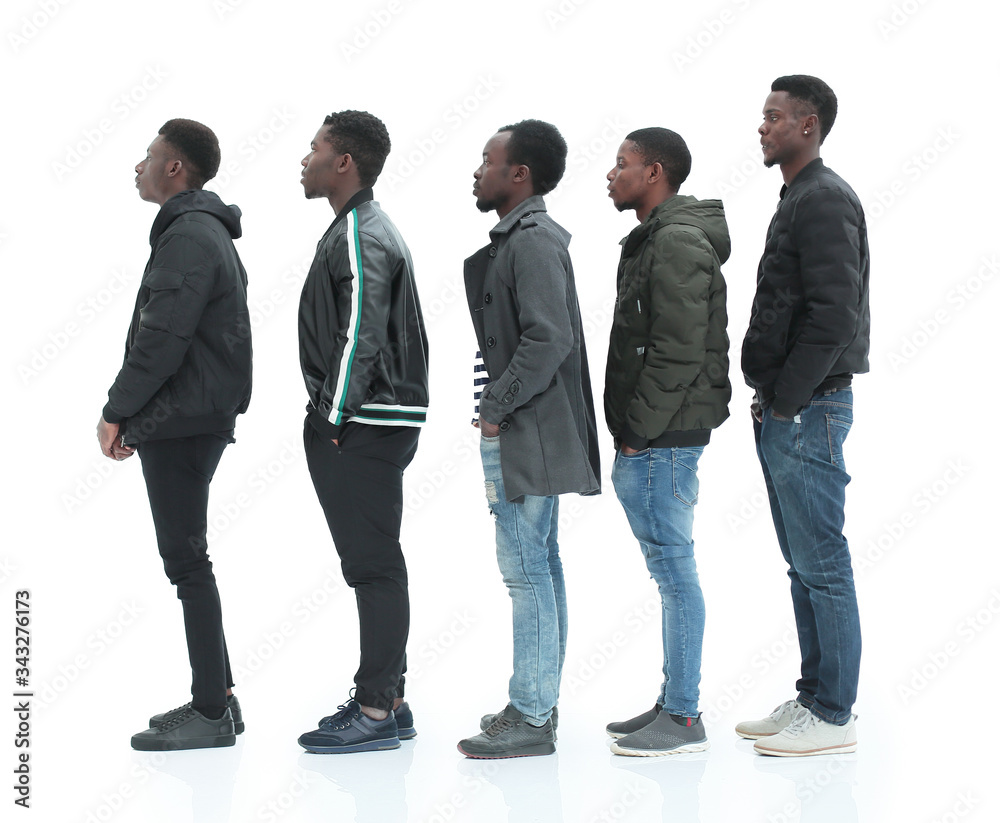 group of diverse guys standing in turns . isolated on white group of diverse guys standing in turns . isolated on white