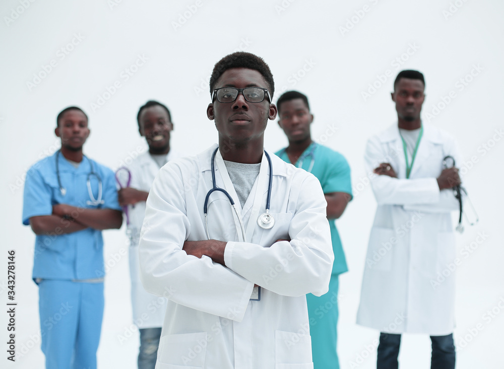 leading medical specialist on the background of his colleagues leading medical specialist on the background of his colleagues