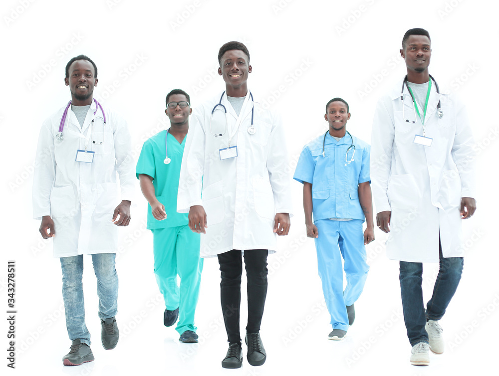 group of different doctors rush to the rescue. isolated on white group of different doctors rush to the rescue. isolated on white