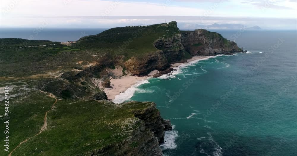 Aerial shot of a scenic cove among amazing cliffs, drone flying backwards - Cape Town, South Africa Aerial shot of a scenic cove among amazing cliffs, drone flying backwards - Cape Town, South Africa