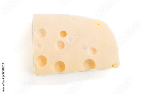 Piece of yellow cheese isolated on white background. Top view.