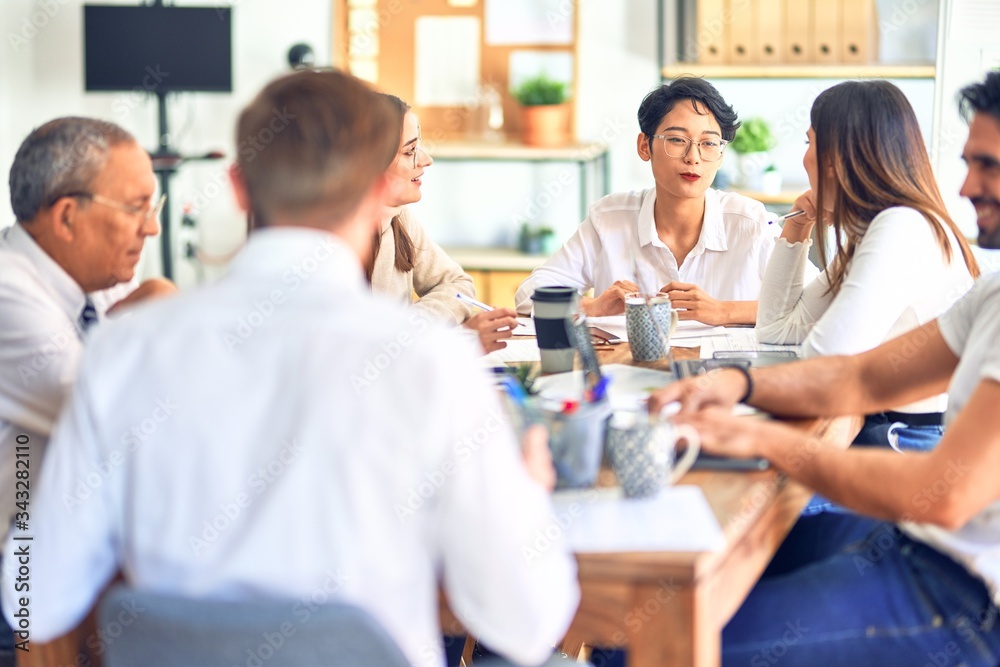 Group of business workers working together at the office