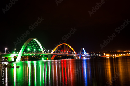 The Juscelino Kubitschek bridge in Brasília with a colorful illumination.